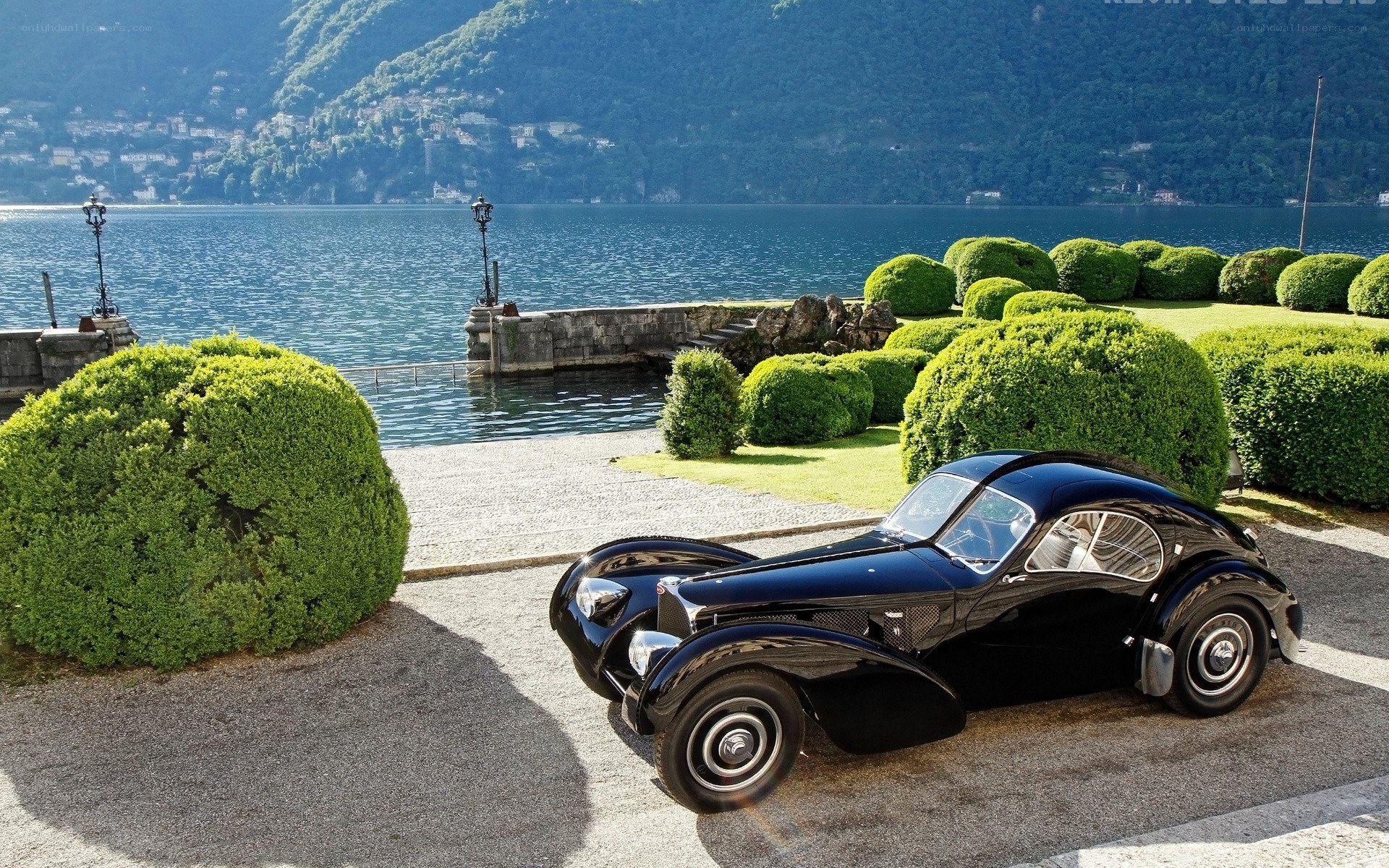 Classic car by a lakeside