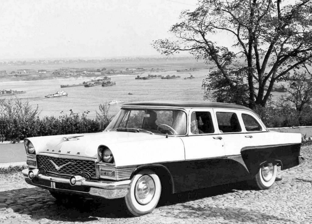 Classic car by a river