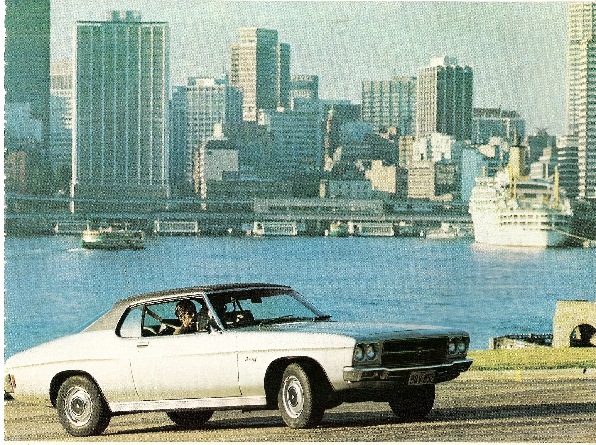 Classic car by the harbor