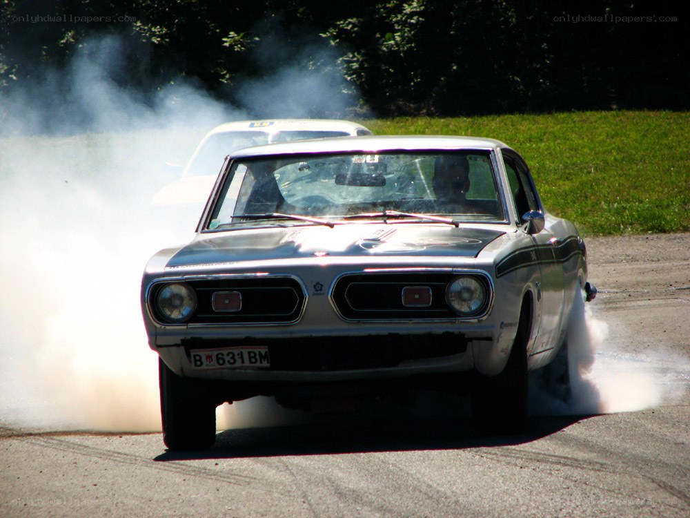 Classic car drifting on track