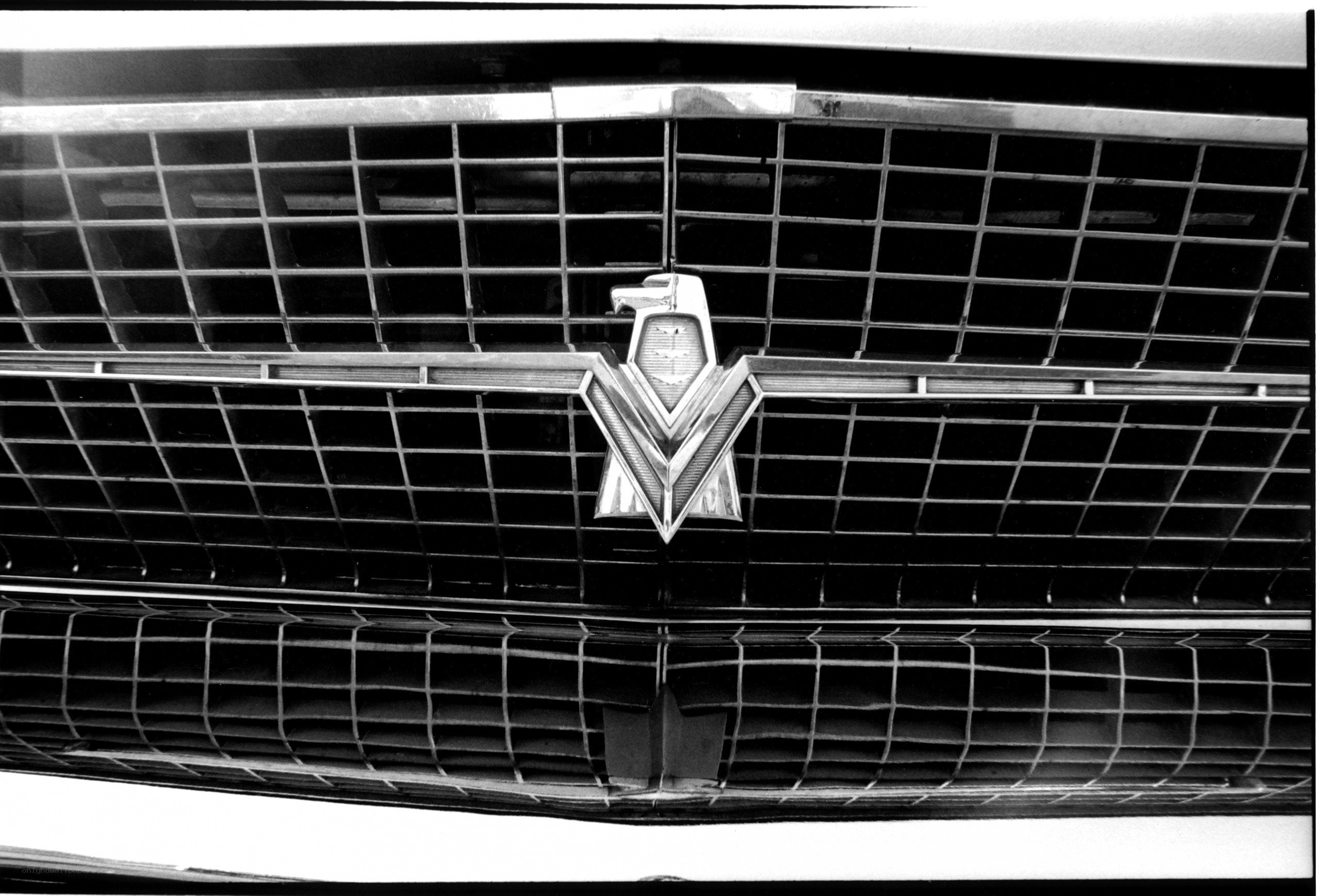 Classic car emblem on grille