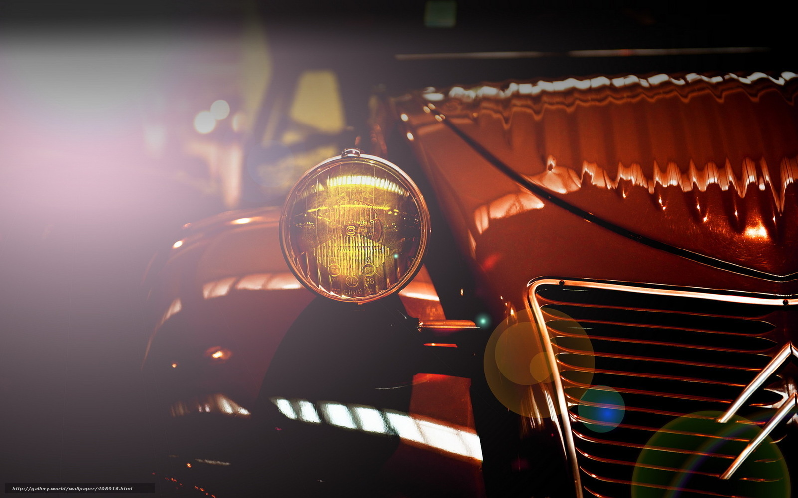 Classic car headlight in warm light