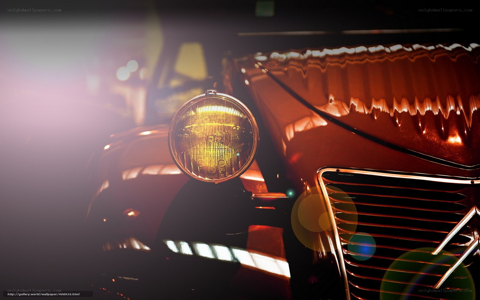 Classic car headlight in warm light