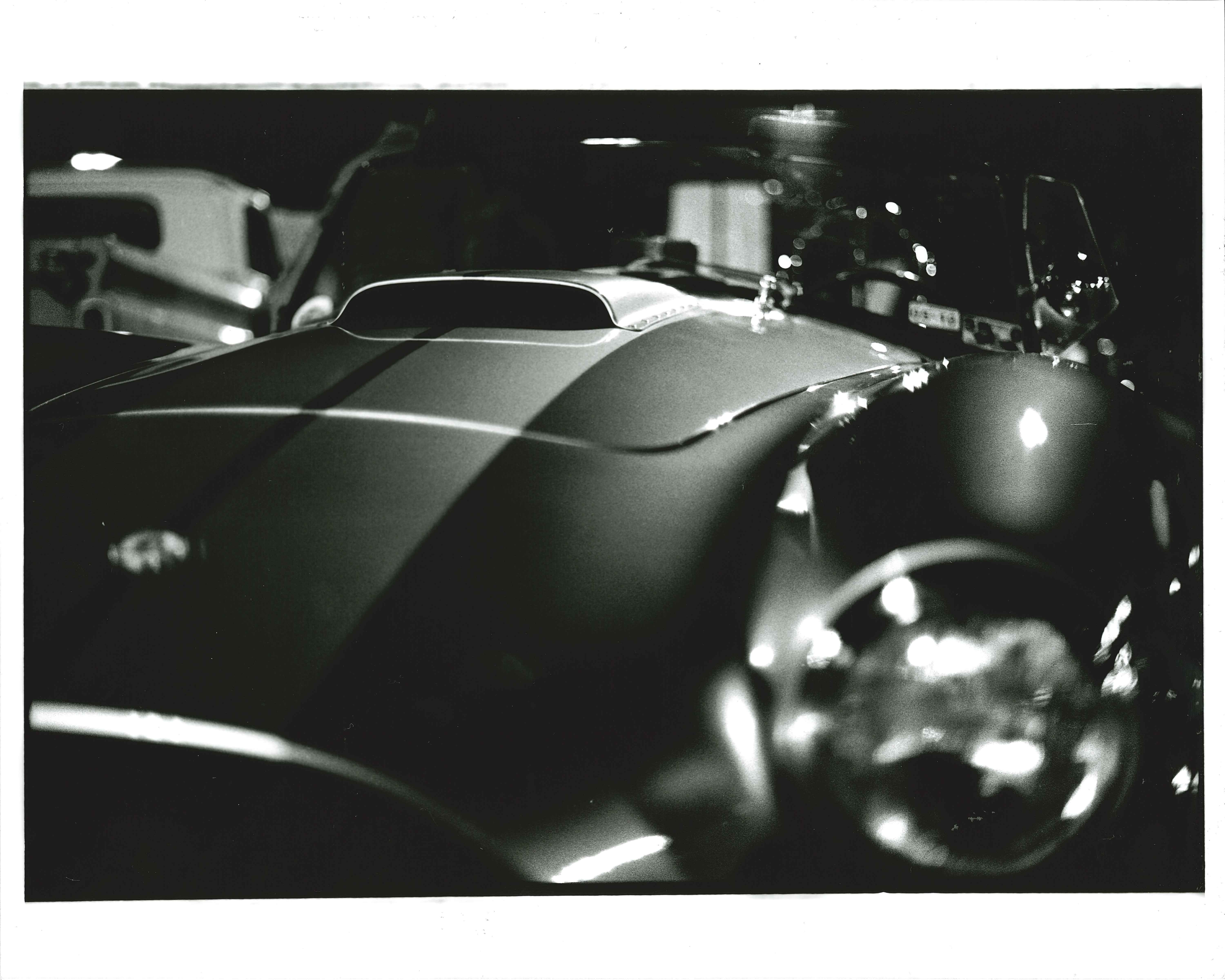 Classic car hood at night