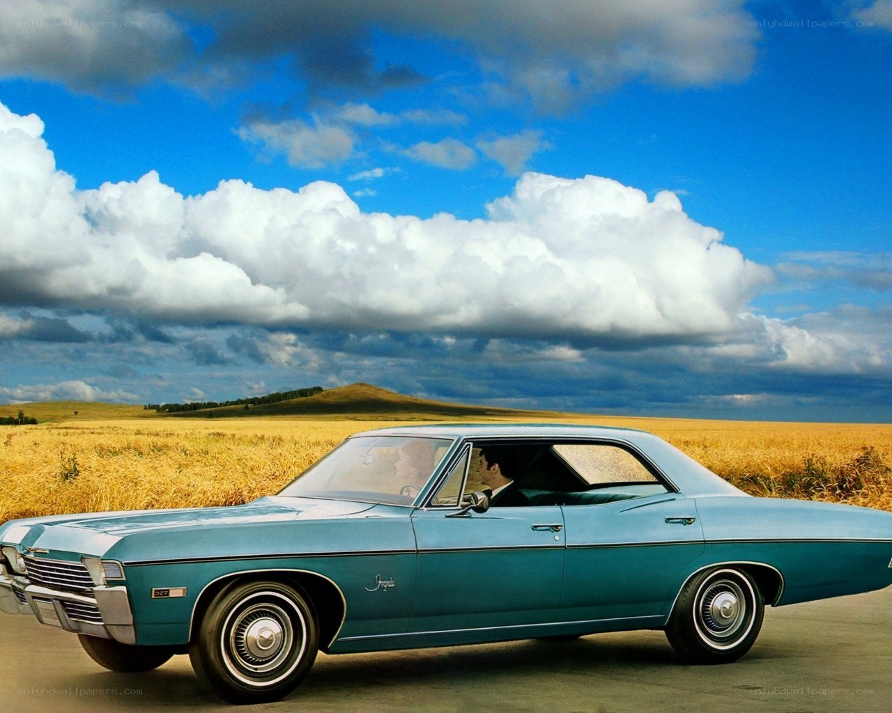 Classic car in a field