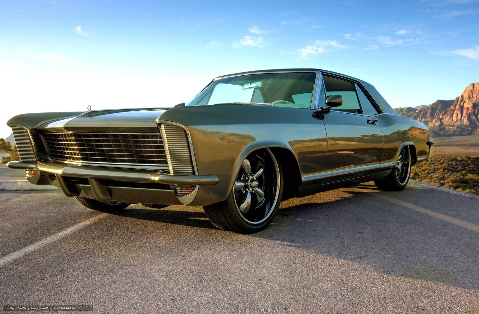Classic car in desert landscape