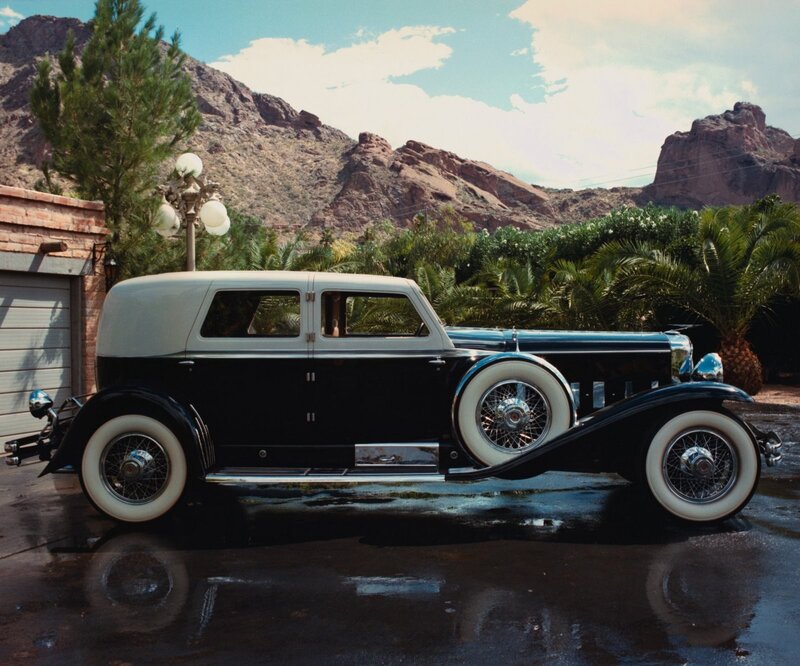 Classic car in desert setting