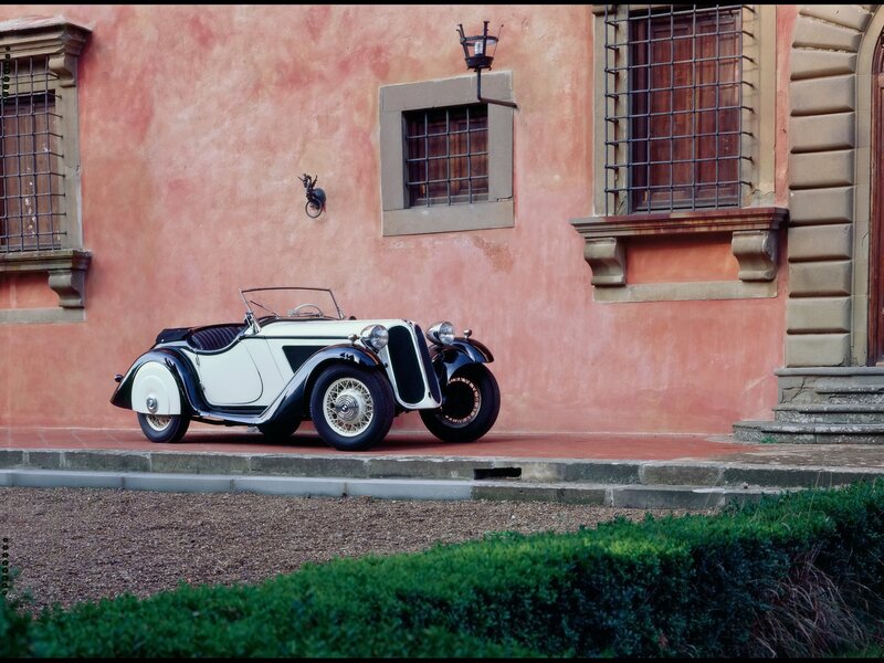 Classic car in front of a building