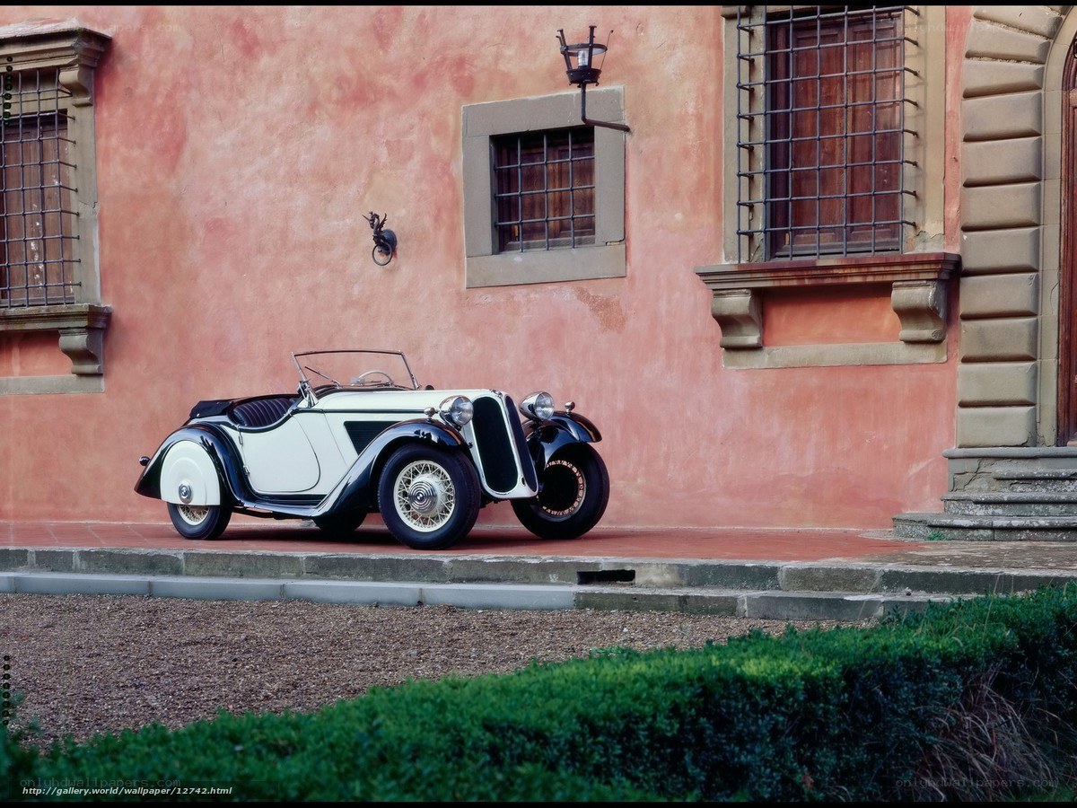 Classic car in front of a building