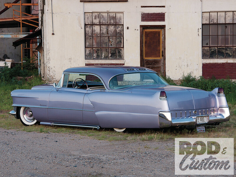 Classic Car in Front of Building — Silver