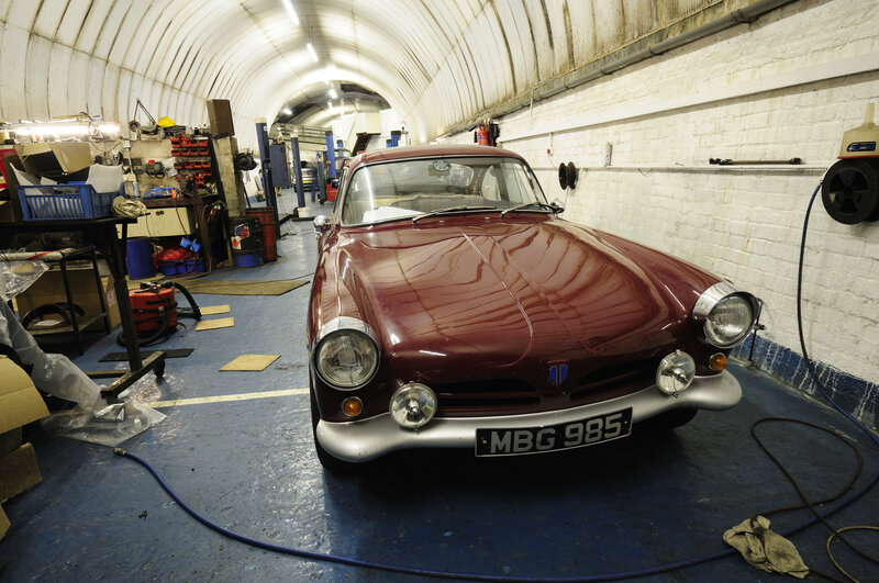 Classic car in garage workshop