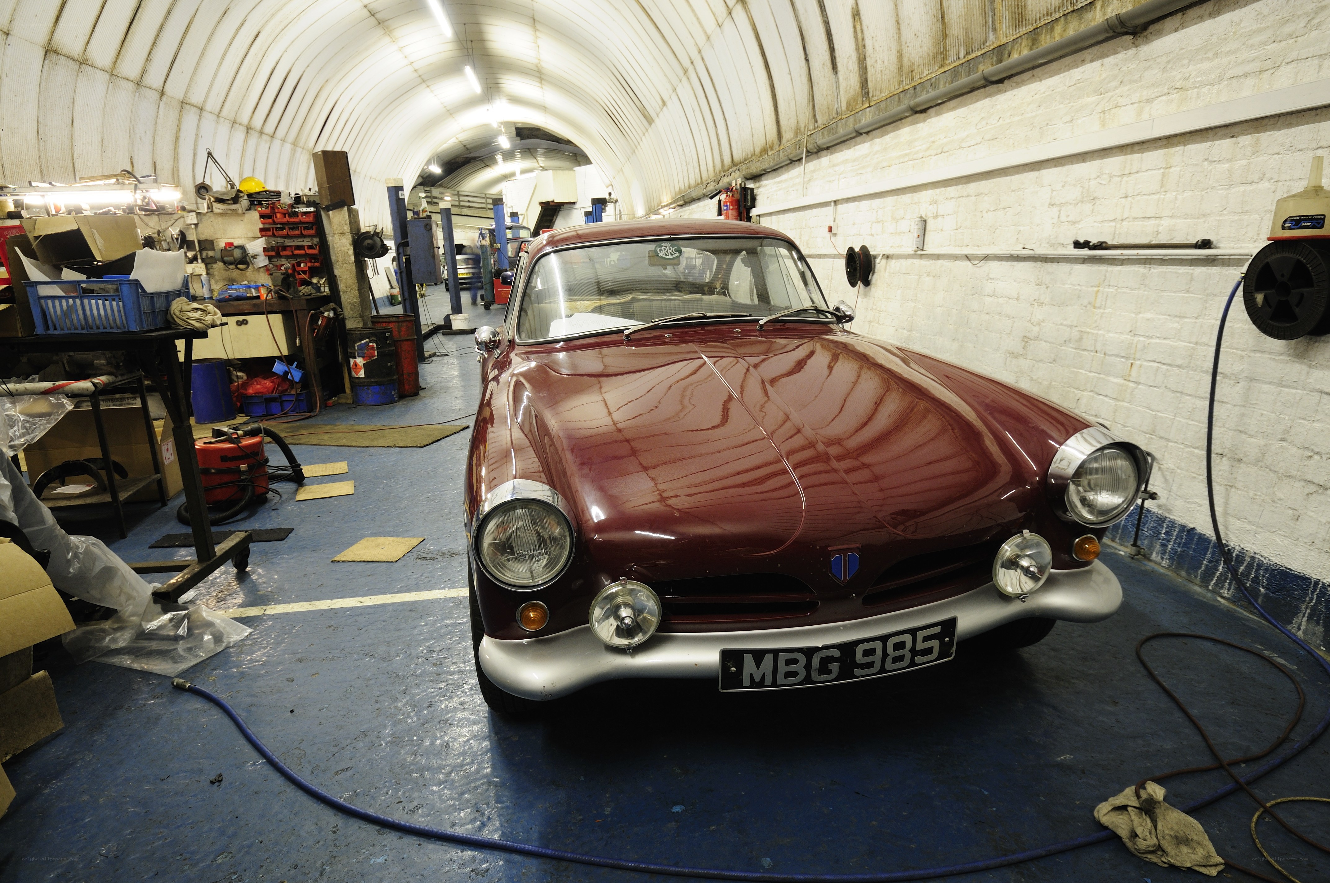 Classic car in garage workshop