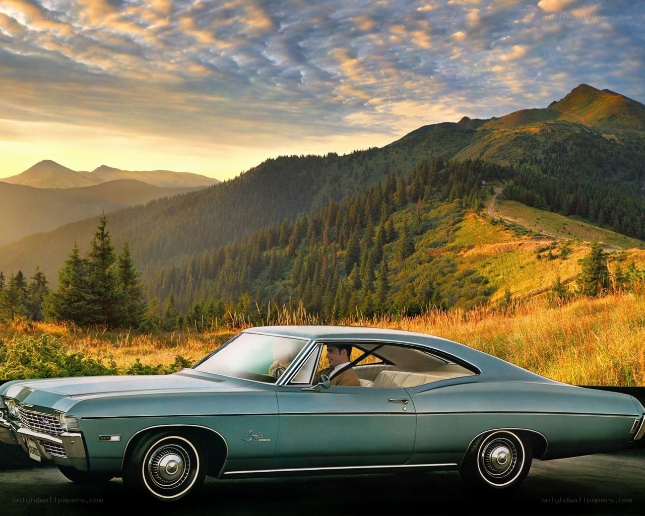 Classic car in mountain landscape