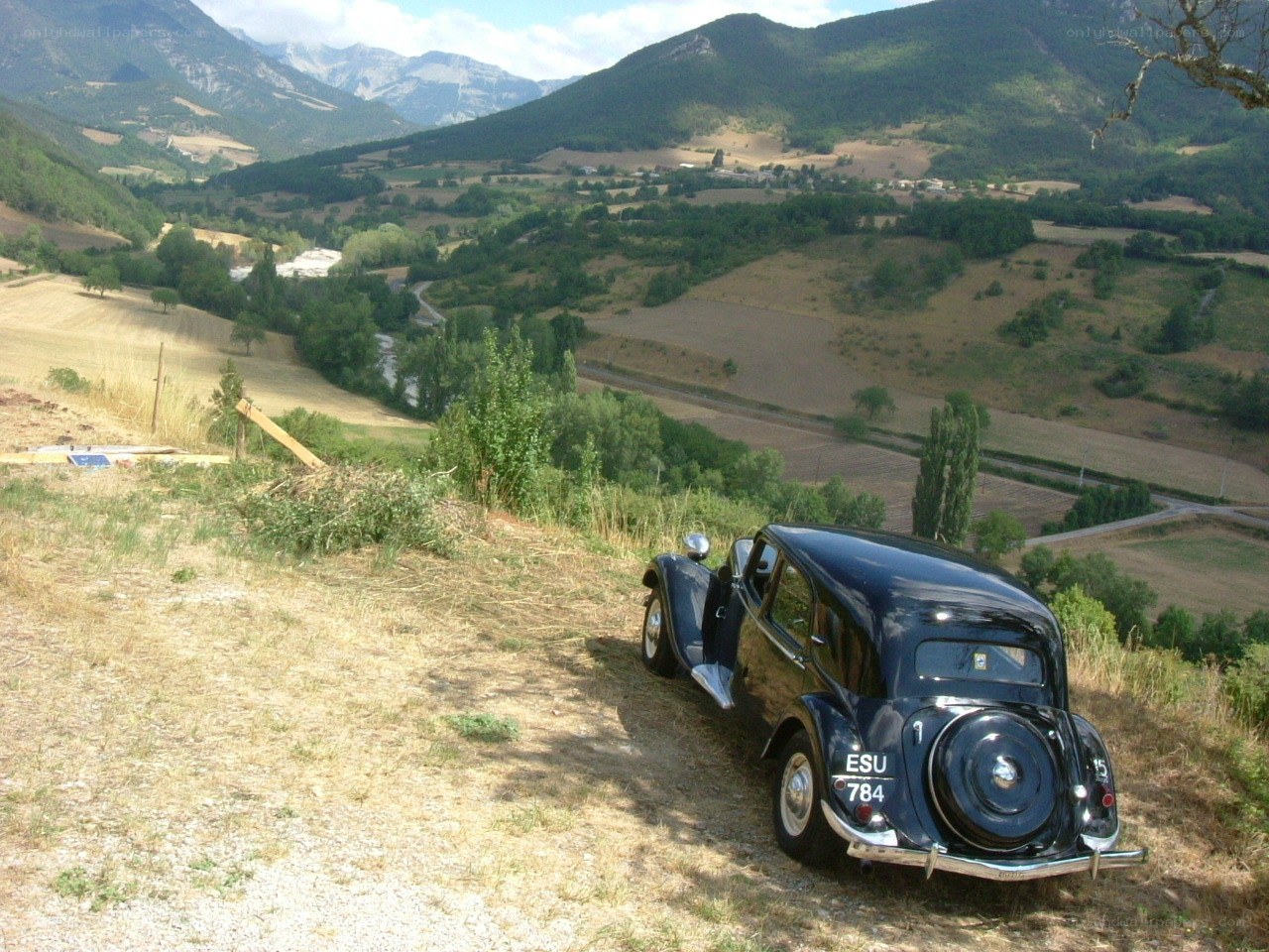 Classic car in mountain valley