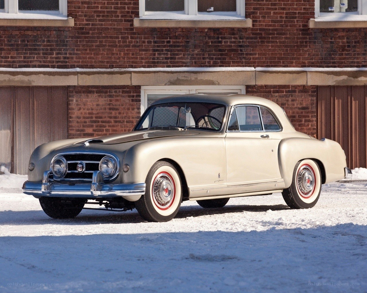 Classic car in snowy setting