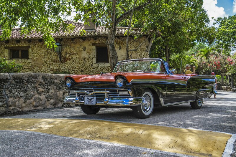 Classic car in tropical setting