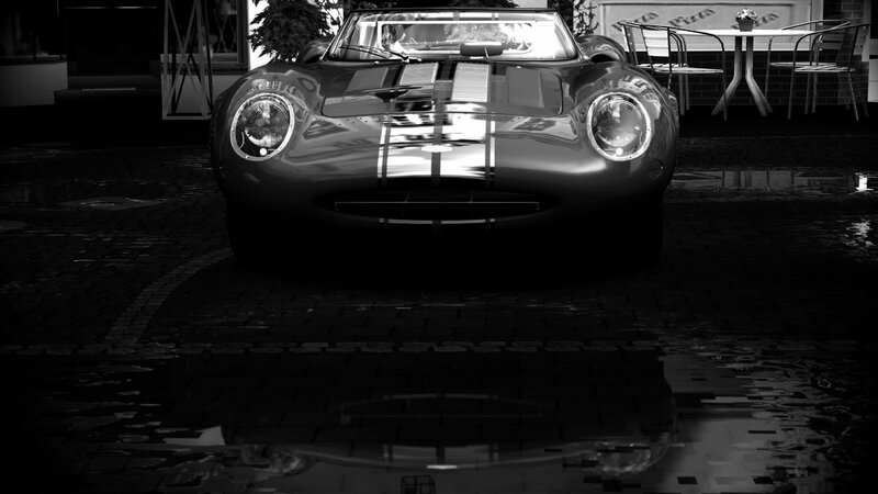 Classic car in wet courtyard