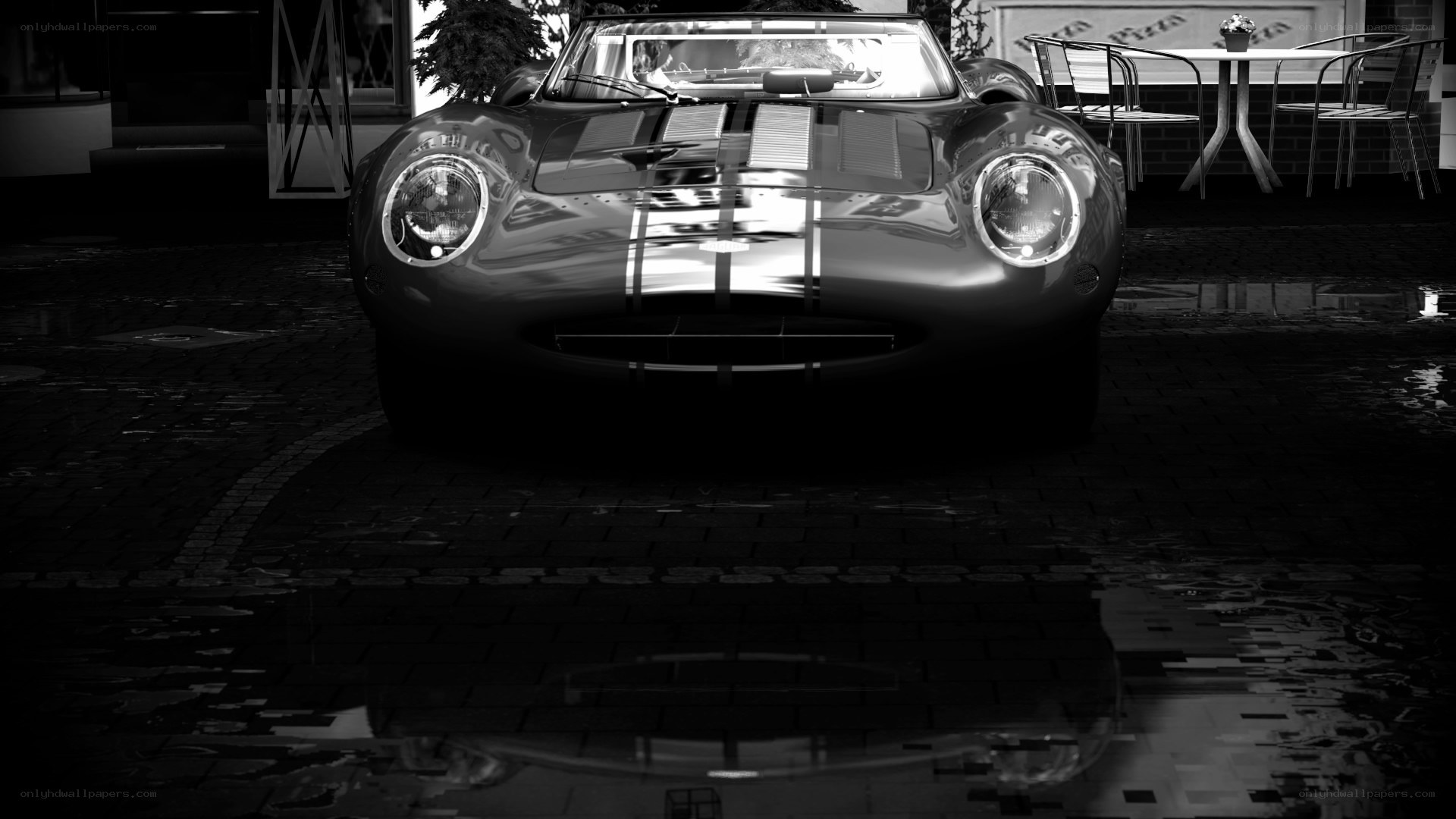 Classic car in wet courtyard