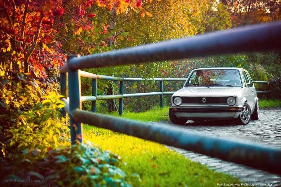 Classic car on a cobblestone road