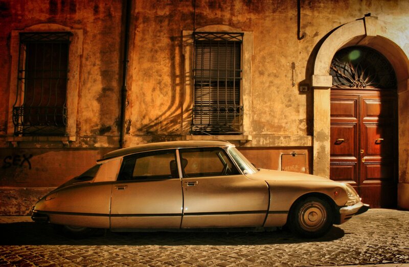 Classic car on a cobblestone street