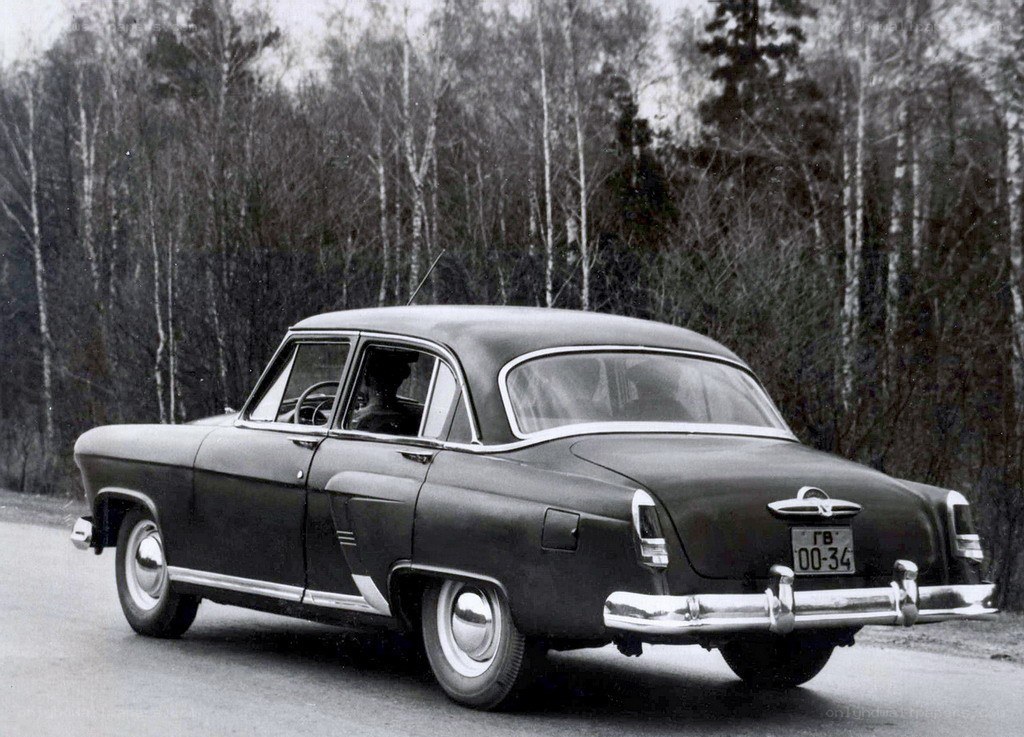 Classic car on a forest road
