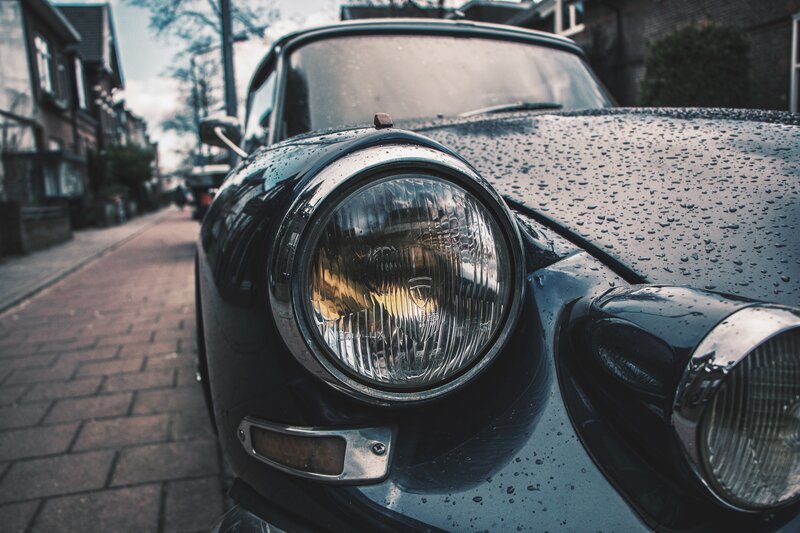 classic car on a rainy street
