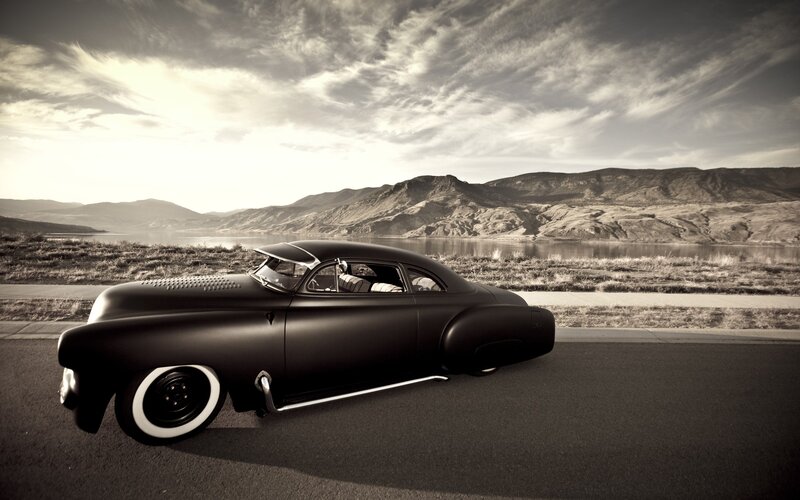 Classic car on a scenic road