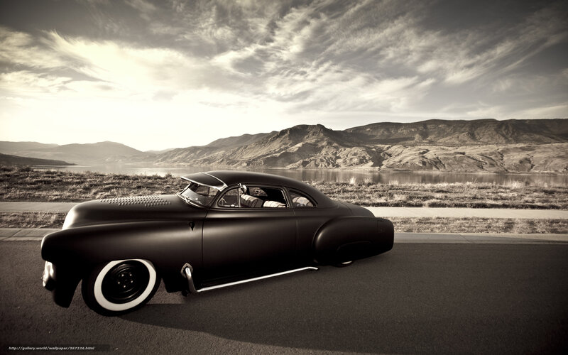 Classic car on a scenic road