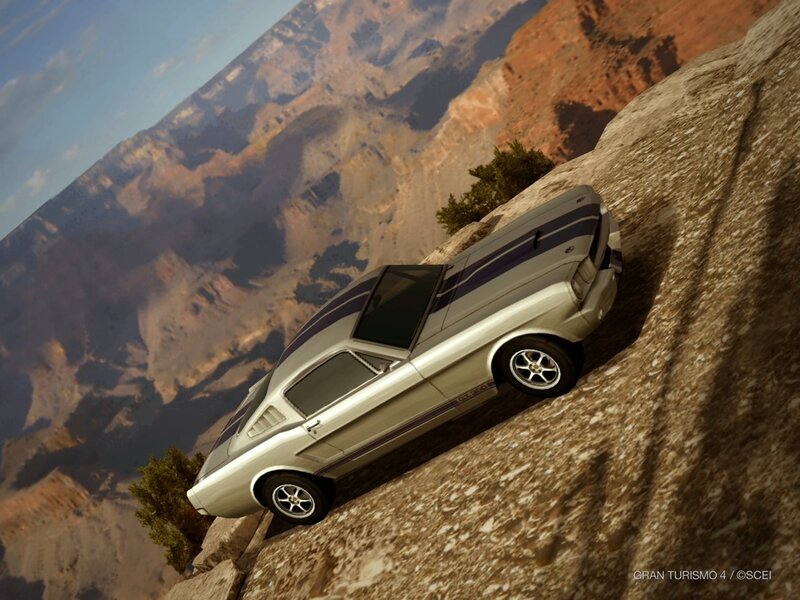 classic car on canyon edge
