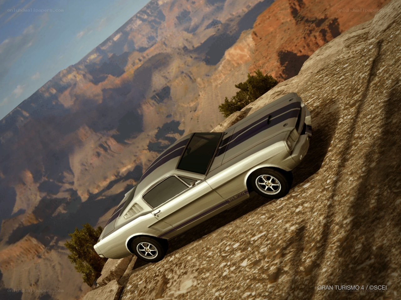 classic car on canyon edge
