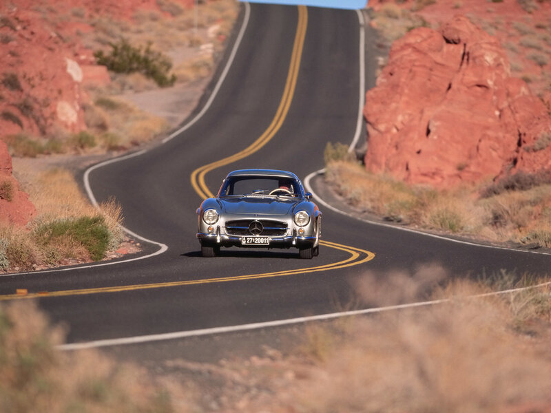 Classic car on desert road