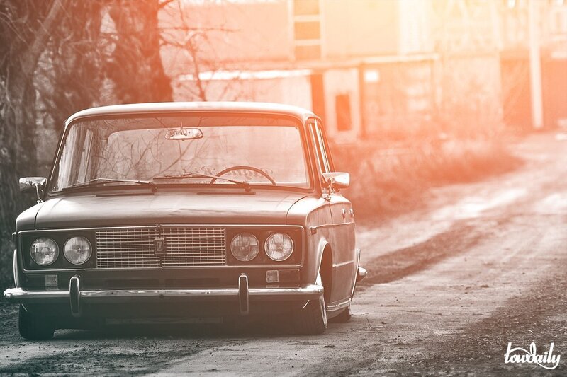 Classic Car on Dirt Road — Orange