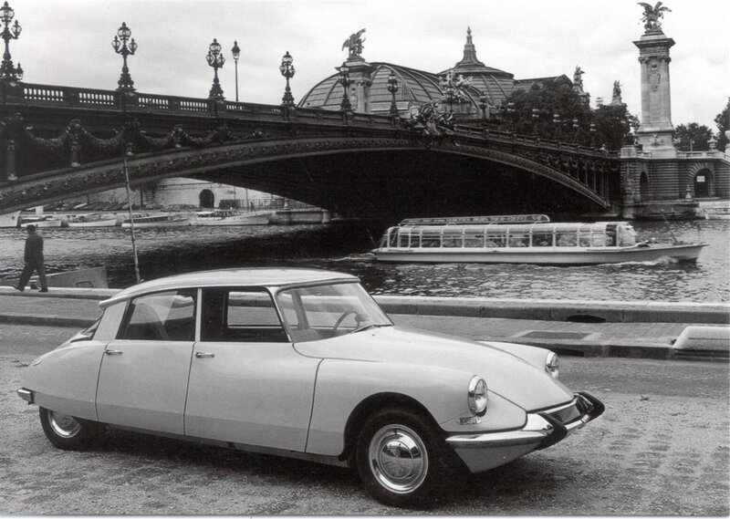 Classic car on Paris riverbank