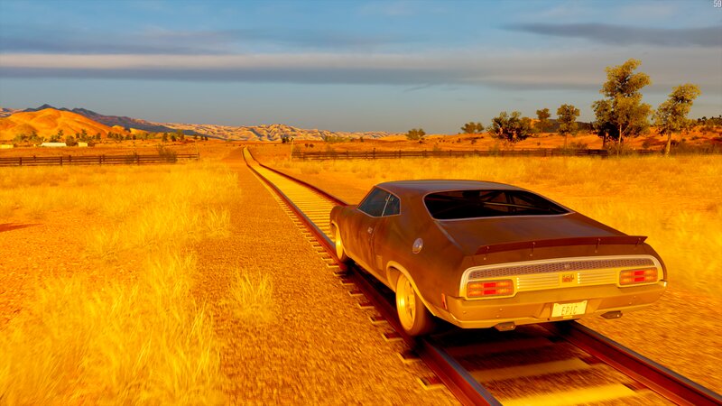 Classic Car on Train Tracks
