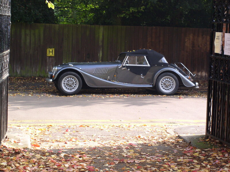 Classic car parked in autumn