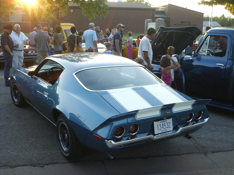 Classic car show at sunset
