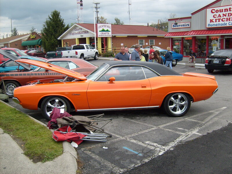 Classic car show in a parking lot