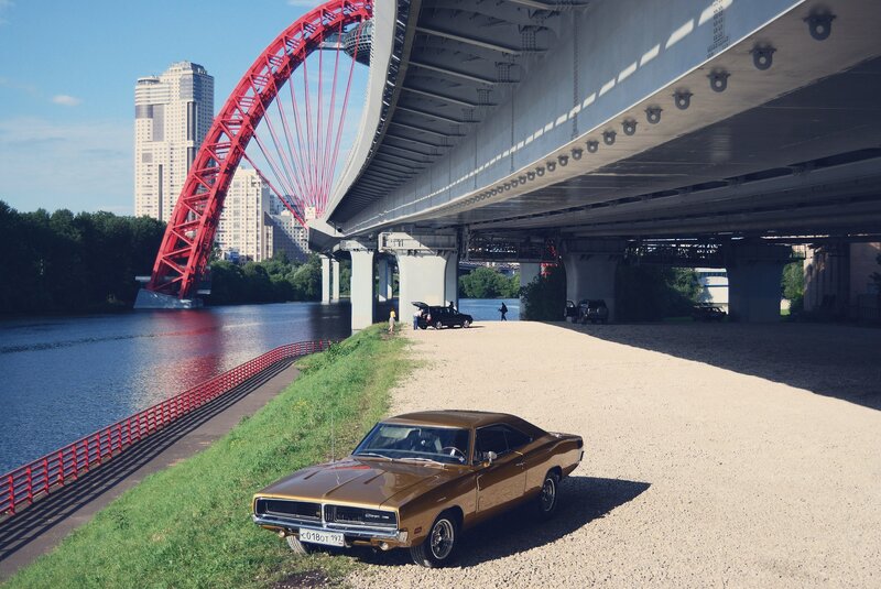 Classic car under a bridge