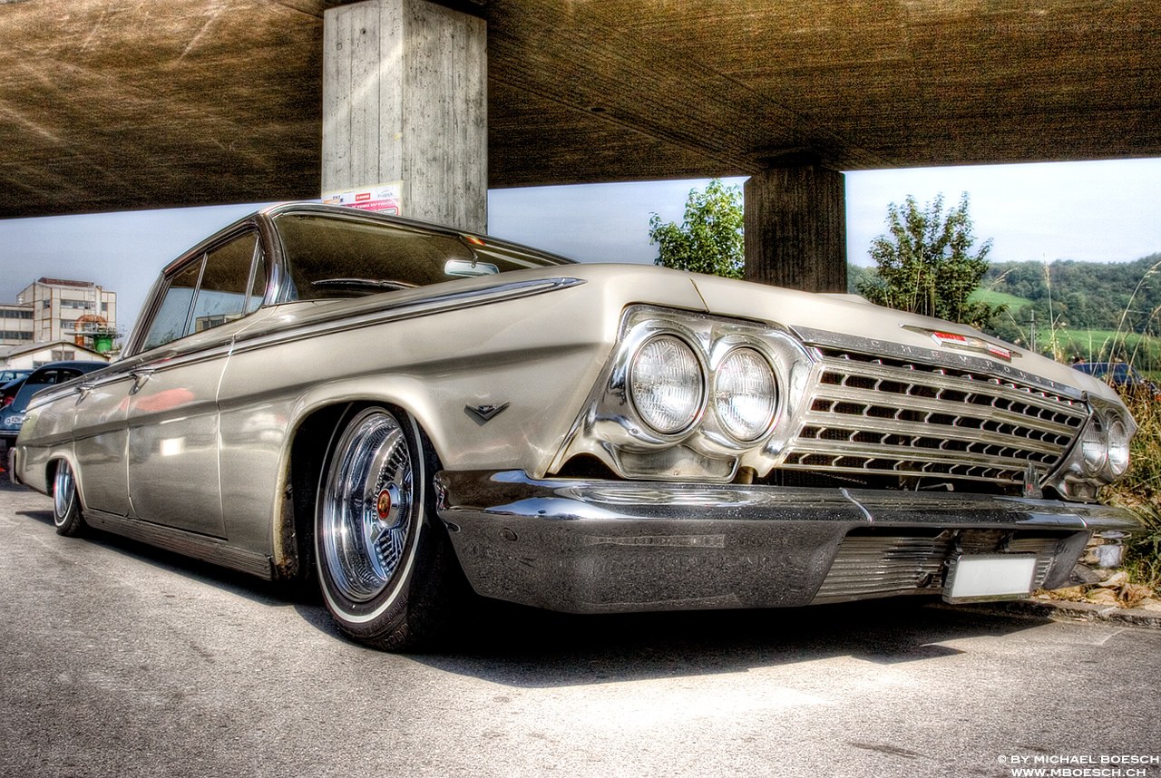 Classic car under an overpass