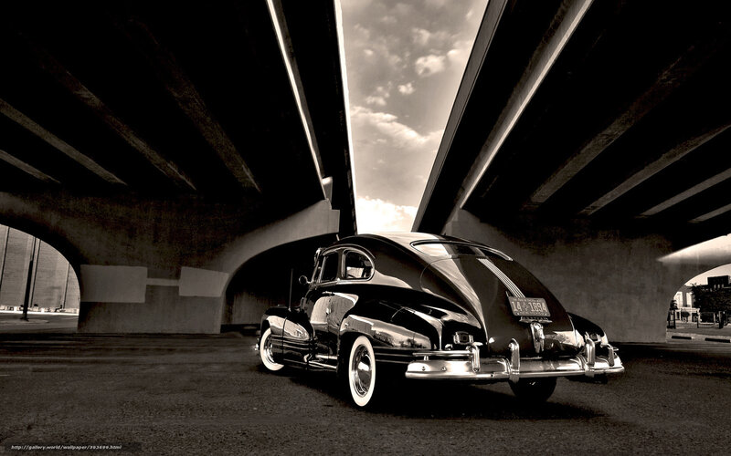 Classic car under bridge