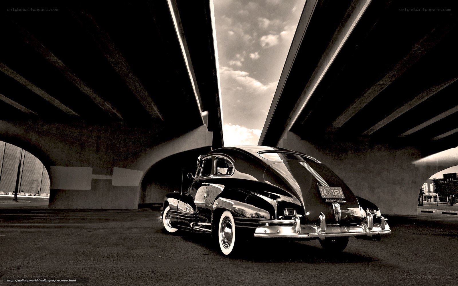 Classic car under bridge