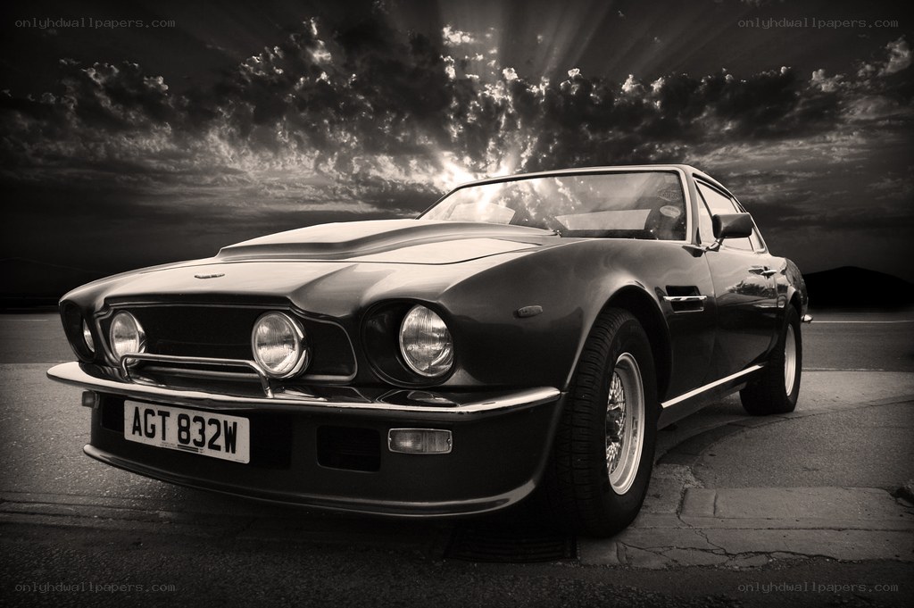 classic car under dramatic sky