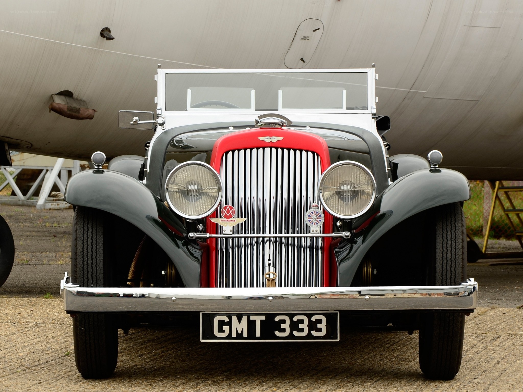 Classic car with airplane