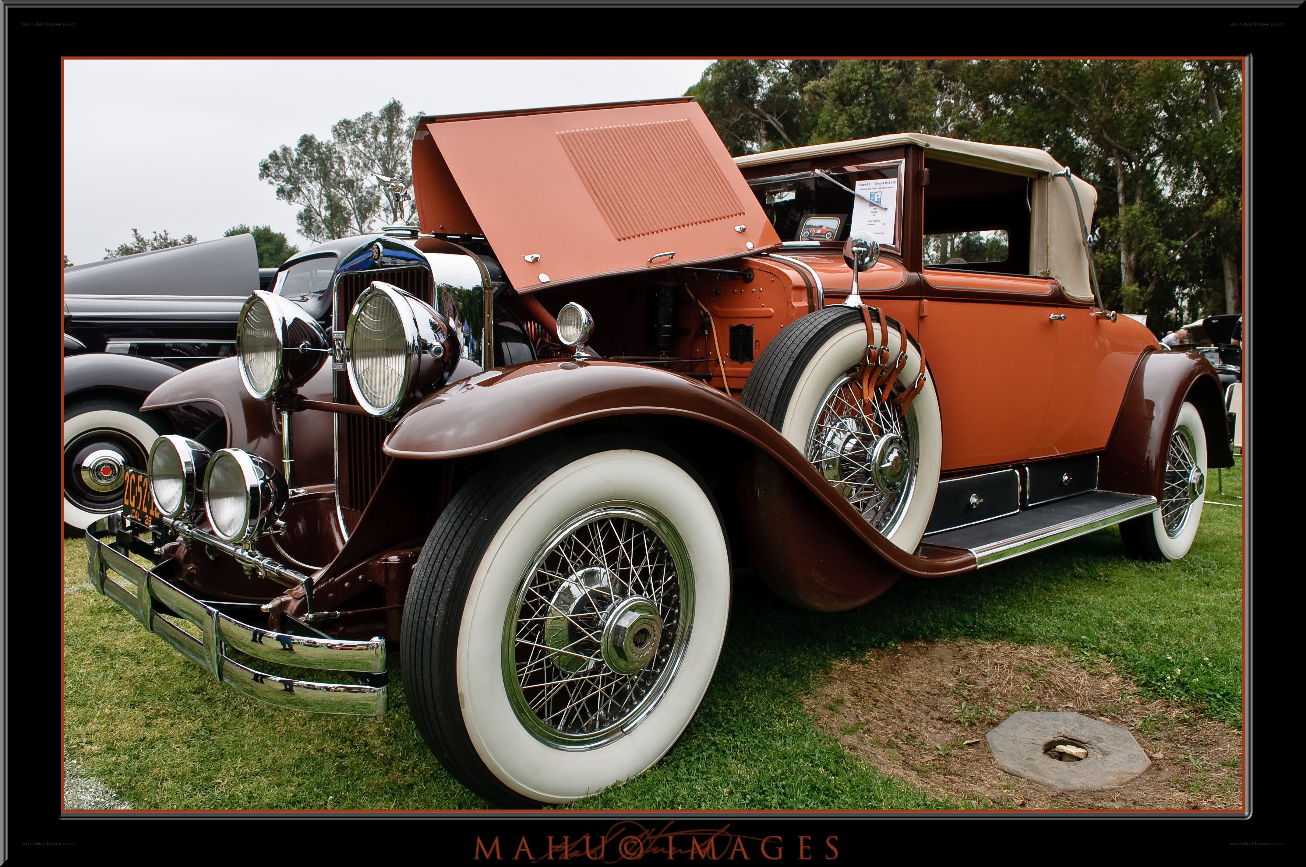 Classic car with open hood