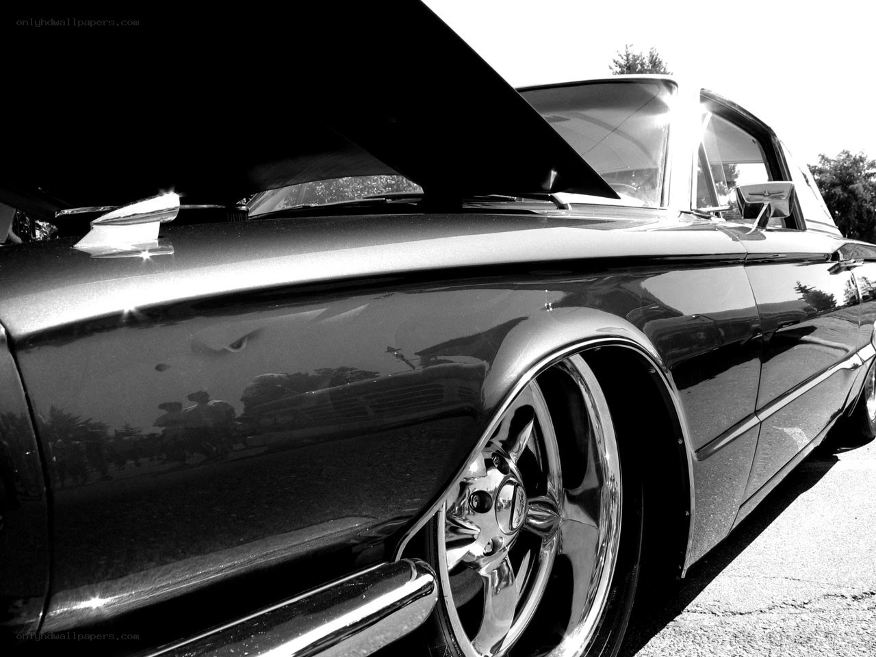 classic car with open hood