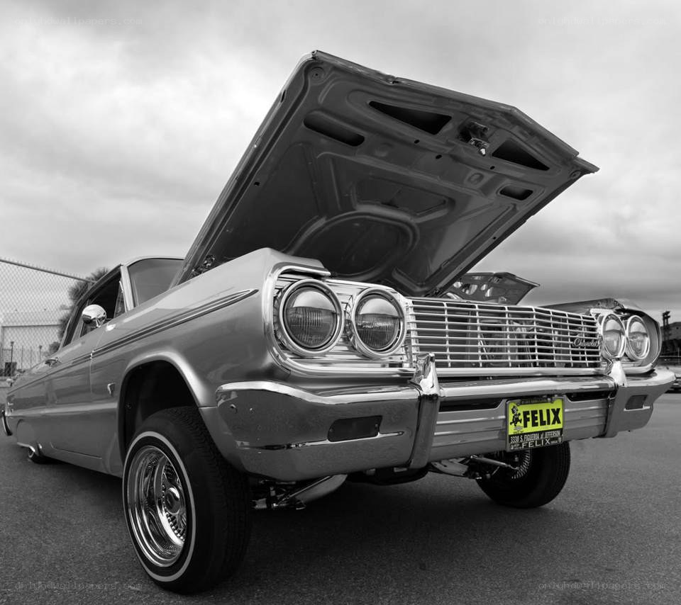 classic car with open hood