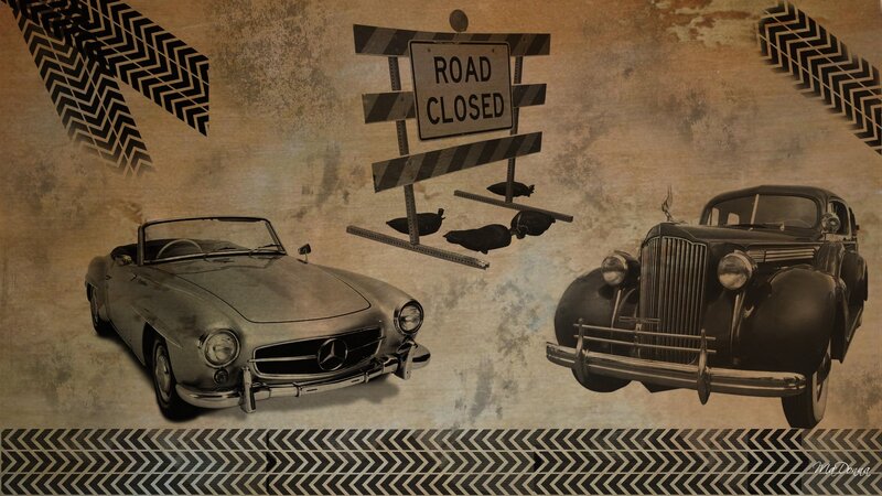 Classic cars and road closed sign