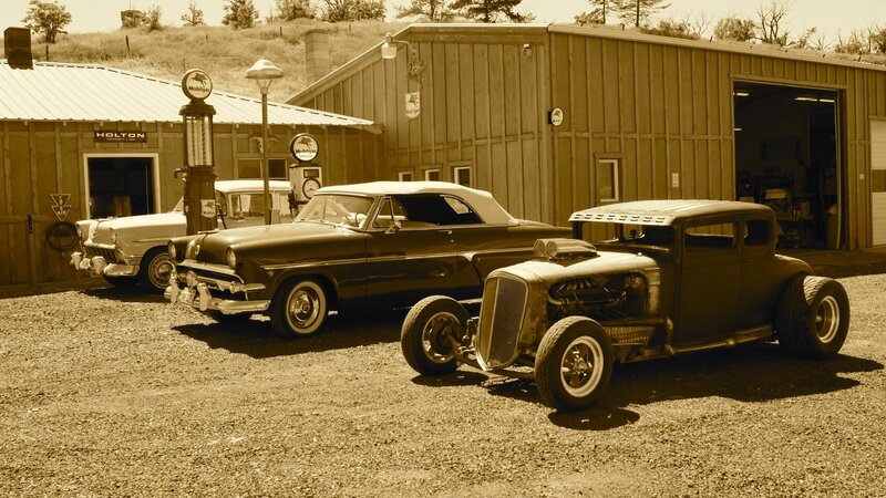 Classic cars at a garage