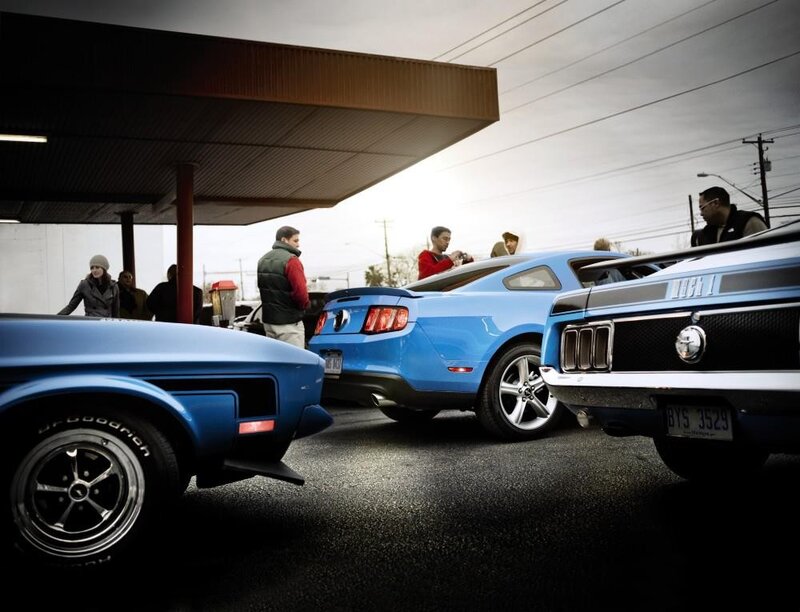 Classic cars at a gas station