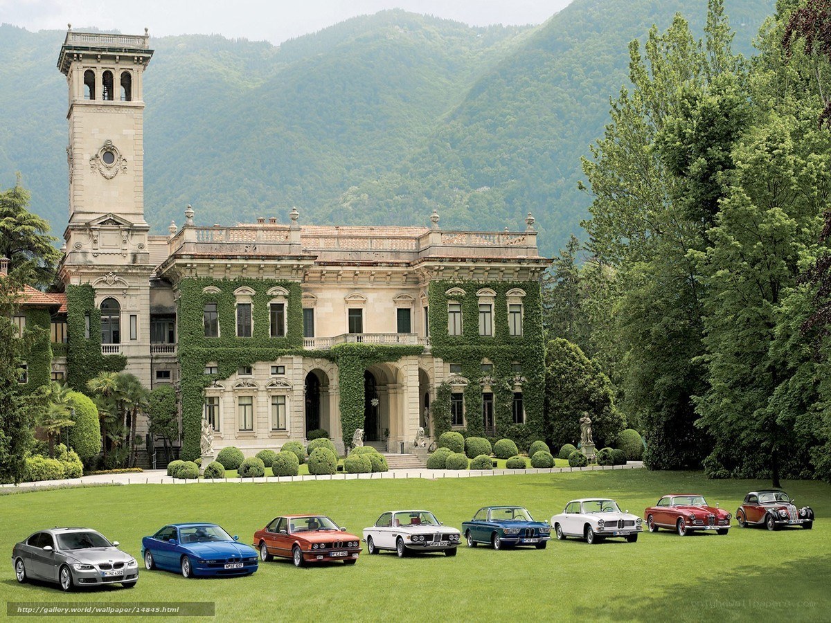 Classic cars at a grand estate